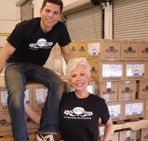GT Dave with his mother and SYNERGY Raw Kombucha cases